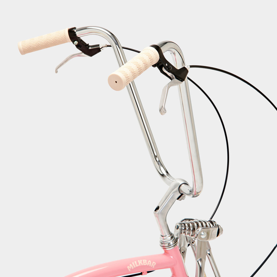 Pink Lemonade 20" Milkbar bike side view of handle bars. 